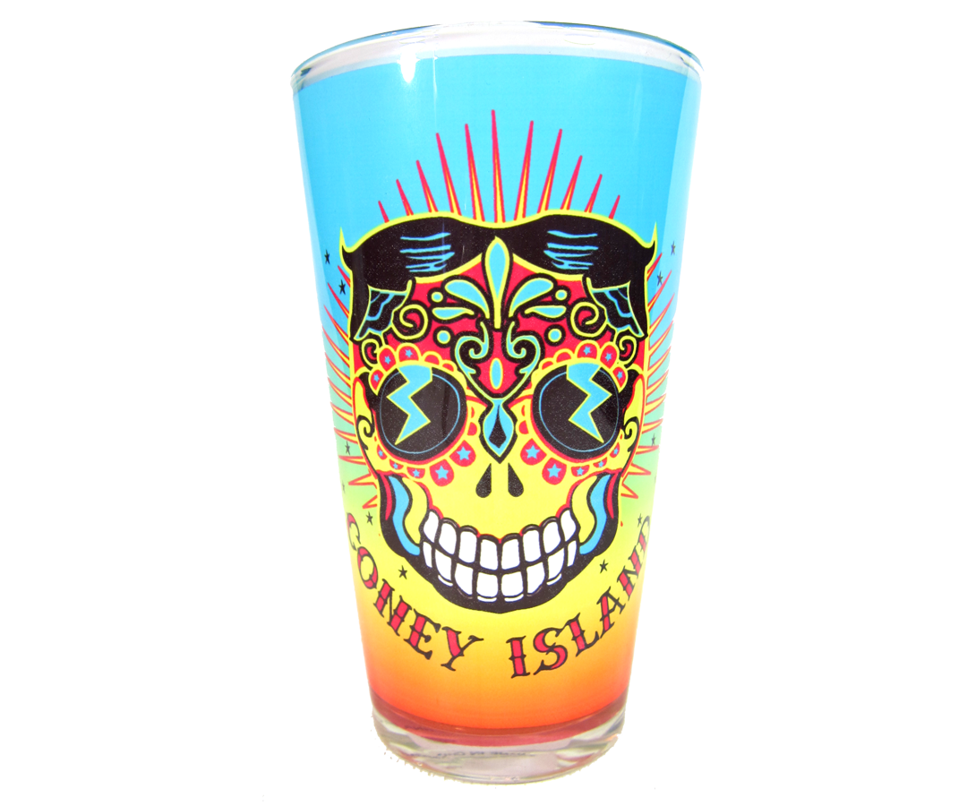 Load image into Gallery viewer,  Coney Island pint glass, vibrant, colorful Tillie Day of the Dead design on a handmade pint glass, handmade gifts made in Brooklyn NY
