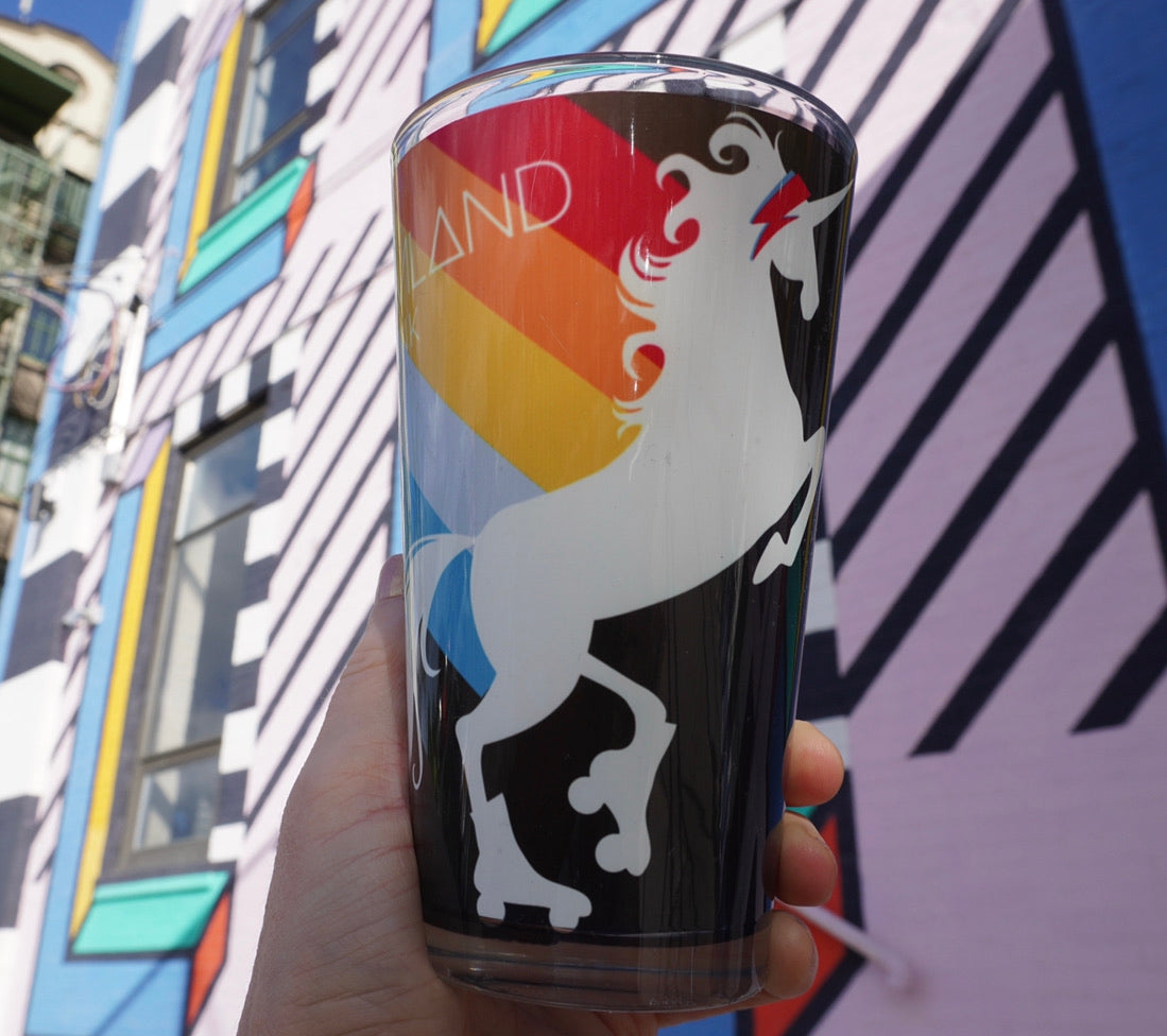 Load image into Gallery viewer, Roller skating pint glass, fun unicorn design on a handmade pint glass handmade gifts for everyone made in Brooklyn NY
