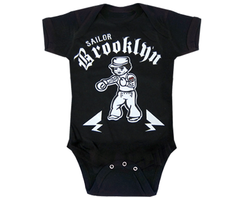 A Brooklyn onesie. A vintage sailor and tattoo parlor design on a baby's black onesie. Handmade for babies and parents to be made in Brooklyn New York. The perfect gender neutral baby onesie.